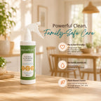 Clean Earth Natural All-Purpose Cleaner spray bottle on a wooden dining table in a cozy home setting, with text reading "Powerful Clean, Family-Safe Care" and highlighting pet-and-kid-friendly, non-toxic, and plant-based enzyme benefits.