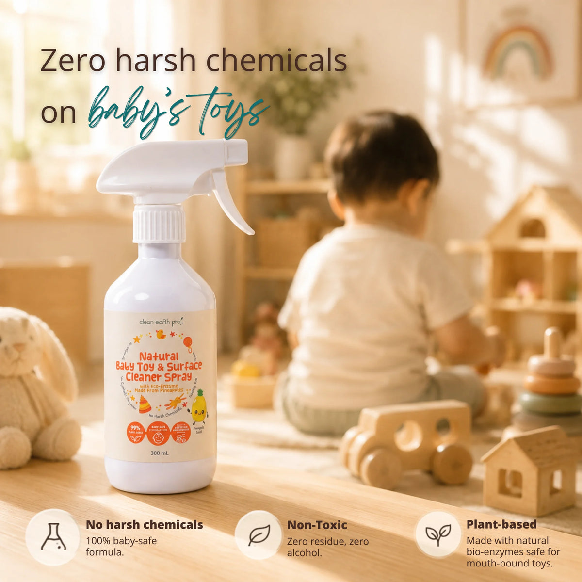 Clean Earth Natural Baby Toy & Surface Cleaner Spray bottle in the foreground with a child playing in a sunlit playroom, featuring text reading "Zero harsh chemicals on baby's toys" and highlighting no harsh chemicals, non-toxic, and plant-based benefits.